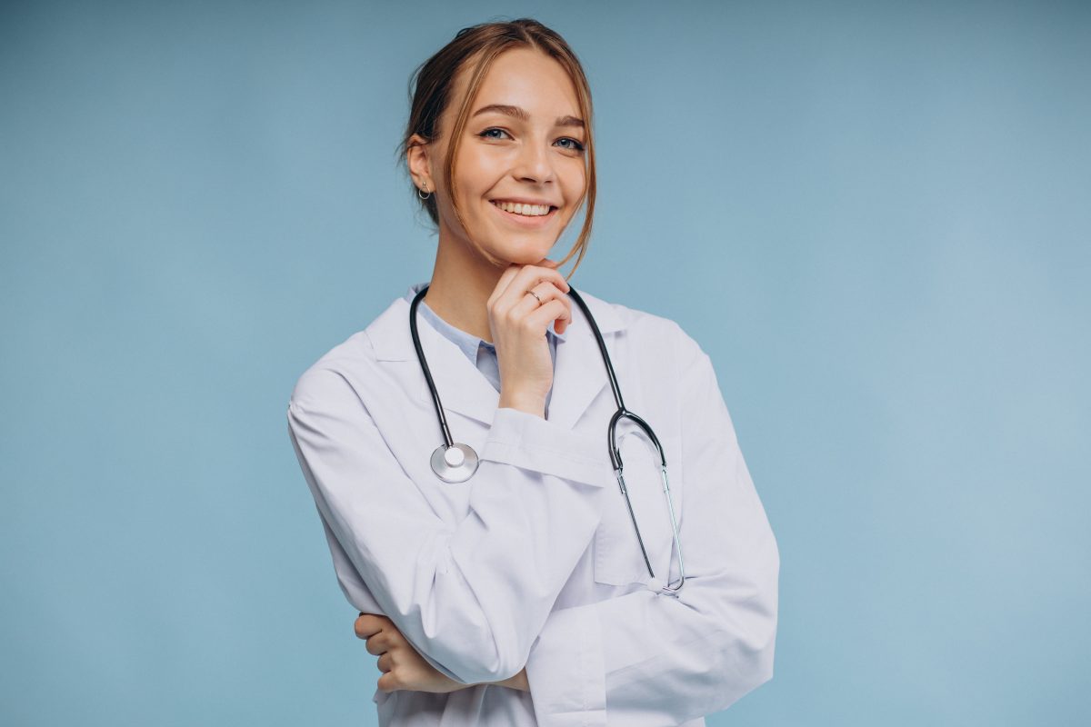 Woman doctor wearing lab coat with stethoscope